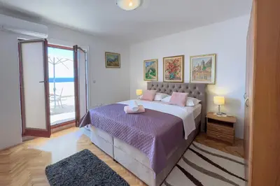 Krevet ili kreveti u jedinici u objektu Apartments by the sea Podstrana, Split - 14993