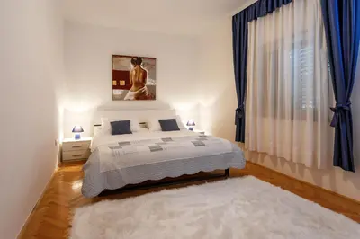 Krevet ili kreveti u jedinici u objektu Family friendly apartments with a swimming pool Podstrana, Split - 15040