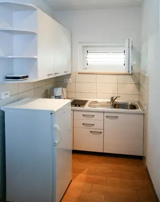 Kuhinja ili čajna kuhinja u objektu Apartments by the sea Brela, Makarska - 13052