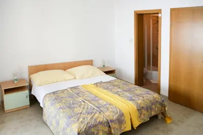 Krevet ili kreveti u jedinici u objektu Apartments by the sea Brela, Makarska - 13052