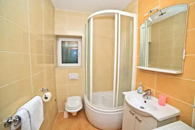 Kupaonica u objektu Apartments Bozikovic