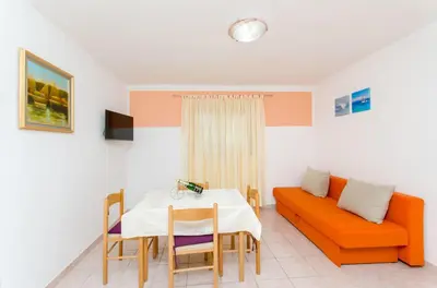 TV i/ili zabavni centar u objektu Apartments Mateo