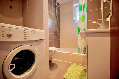 Kupaonica u objektu Sandy Beach Apartments