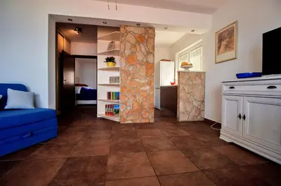 TV i/ili zabavni centar u objektu Sandy Beach Apartments