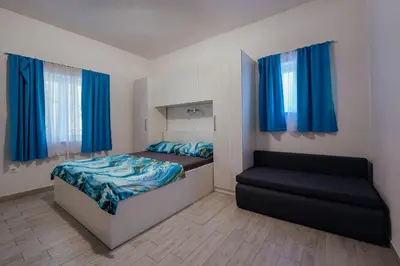 Krevet ili kreveti u jedinici u objektu Apartman M&S s bazenom Split - Podstrana