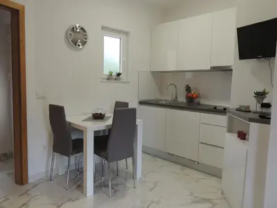 Kuhinja ili čajna kuhinja u objektu Apartments Palma