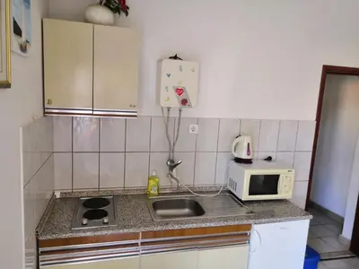 Kuhinja ili čajna kuhinja u objektu Apartments Srhoj
