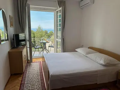 Krevet ili kreveti u jedinici u objektu Spacious family apartment near the beach