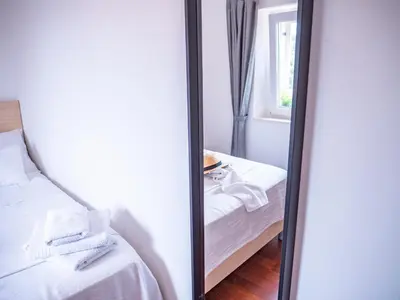 Krevet ili kreveti u jedinici u objektu Pinna Apartments Hvar