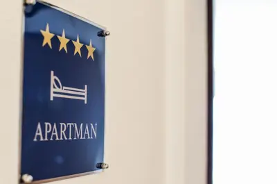 Certifikat, nagrada, logo ili neki drugi dokument izložen u objektu Apartment - Island View