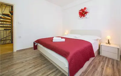 Krevet ili kreveti u jedinici u objektu Three-Bedroom Holiday Home In Stanici