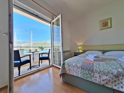 Krevet ili kreveti u jedinici u objektu Rooms and Apartments Porat