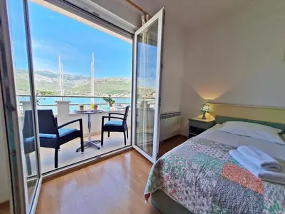 Krevet ili kreveti u jedinici u objektu Rooms and Apartments Porat
