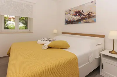Krevet ili kreveti u jedinici u objektu Beach Apartment Korina