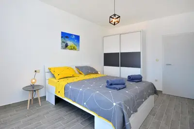 Krevet ili kreveti u jedinici u objektu Sea View Luxury Apartments, ALA DA