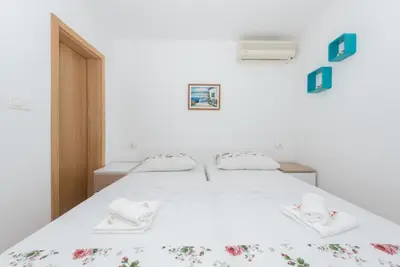 Krevet ili kreveti u jedinici u objektu Apartments Royal M&M