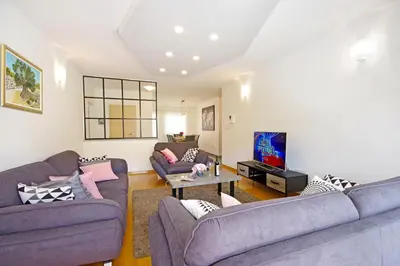 TV i/ili zabavni centar u objektu Luxurious, modern and spacious apartment with terraces