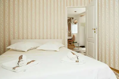 Krevet ili kreveti u jedinici u objektu Apartmani Isabella