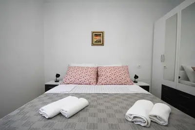 Krevet ili kreveti u jedinici u objektu Apartmani Lovre