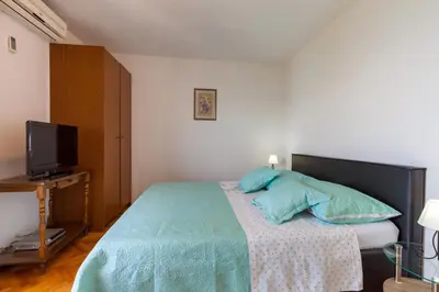 Krevet ili kreveti u jedinici u objektu Rooms Marinac