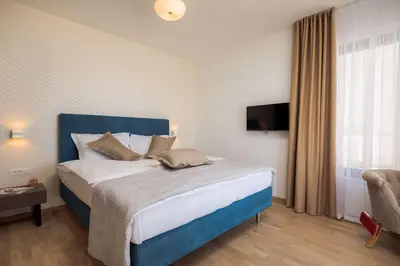Krevet ili kreveti u jedinici u objektu Villa Four Brothers - Exclusive Apartment