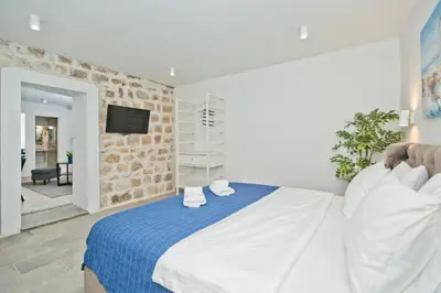 Krevet ili kreveti u jedinici u objektu Apartment and Studios Happy Place