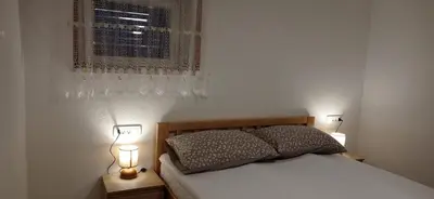 Krevet ili kreveti u jedinici u objektu Vacation House, PARKING INCLUDED, Lovrecina