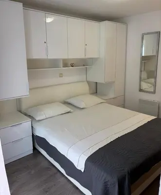 Krevet ili kreveti u jedinici u objektu Baška Voda Apartman Nino