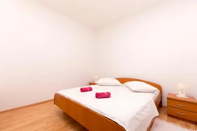 Krevet ili kreveti u jedinici u objektu Apartments A cappella music