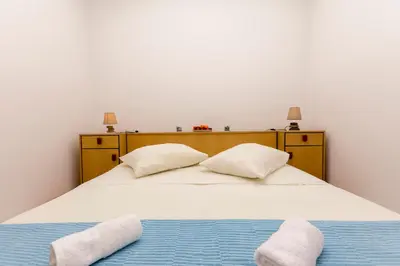 Krevet ili kreveti u jedinici u objektu Apartments A cappella music