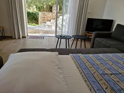 Krevet ili kreveti u jedinici u objektu Villa OLIVE TREE village Pisak heated pool and close to the beach