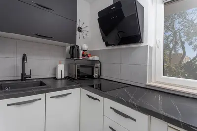 Kuhinja ili čajna kuhinja u objektu Apartments Pera