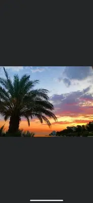 Pogled na izlazak ili zalazak sunca iz apartmana
