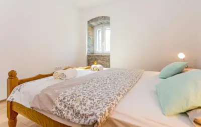 Krevet ili kreveti u jedinici u objektu Apartmani Rebac