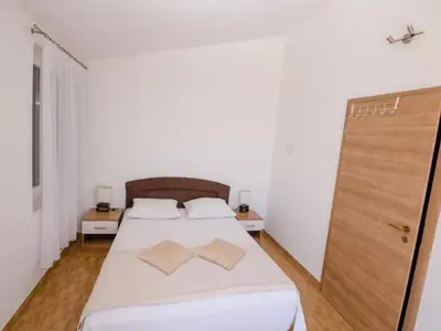 Krevet ili kreveti u jedinici u objektu Apartments Bandalo