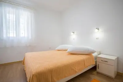 Krevet ili kreveti u jedinici u objektu Apartments Bezmalinović 2