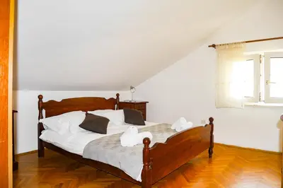 Krevet ili kreveti u jedinici u objektu Apartments Beach Dugi rat
