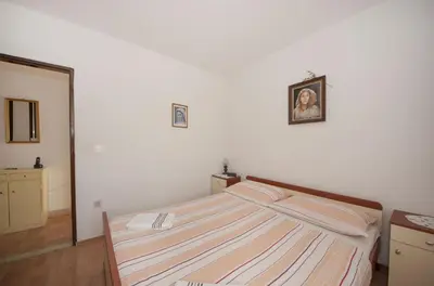 Krevet ili kreveti u jedinici u objektu Apartments Mira
