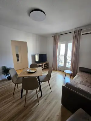 TV i/ili zabavni centar u objektu Lendas Apartments & Rooms