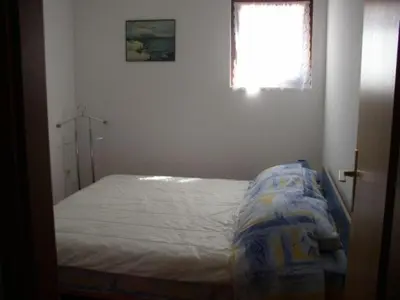 Krevet ili kreveti u jedinici u objektu Apartment in Bol with sea view, balcony, air conditioning, Wi-Fi (652-1)