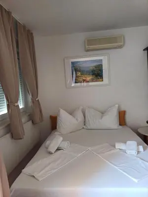Krevet ili kreveti u jedinici u objektu Apartman Magdalena Galileo sa pogledom na more i plazu