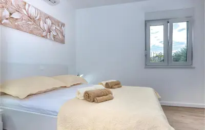 Krevet ili kreveti u jedinici u objektu Lovely Home In Srinjine