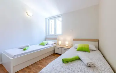 Krevet ili kreveti u jedinici u objektu Apartments Listes