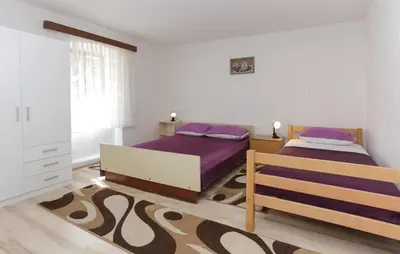 Krevet ili kreveti u jedinici u objektu Apartments with parking space Omis - 16185