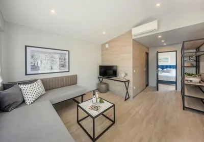 TV i/ili zabavni centar u objektu Gava Waterman Island Cottages - All Inclusive