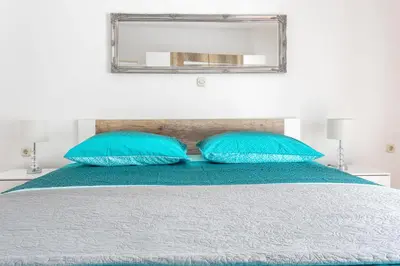 Krevet ili kreveti u jedinici u objektu Apartments Dobrila