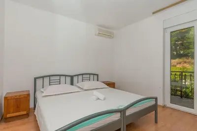 Krevet ili kreveti u jedinici u objektu Apartments Mario