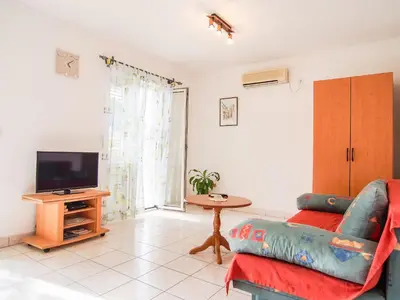 TV i/ili zabavni centar u objektu Apartments Dirk