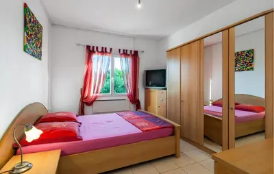 Krevet ili kreveti u jedinici u objektu Two-Bedroom Apartment In Supetar