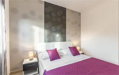 Krevet ili kreveti u jedinici u objektu Two-Bedroom Apartment In Podstrana